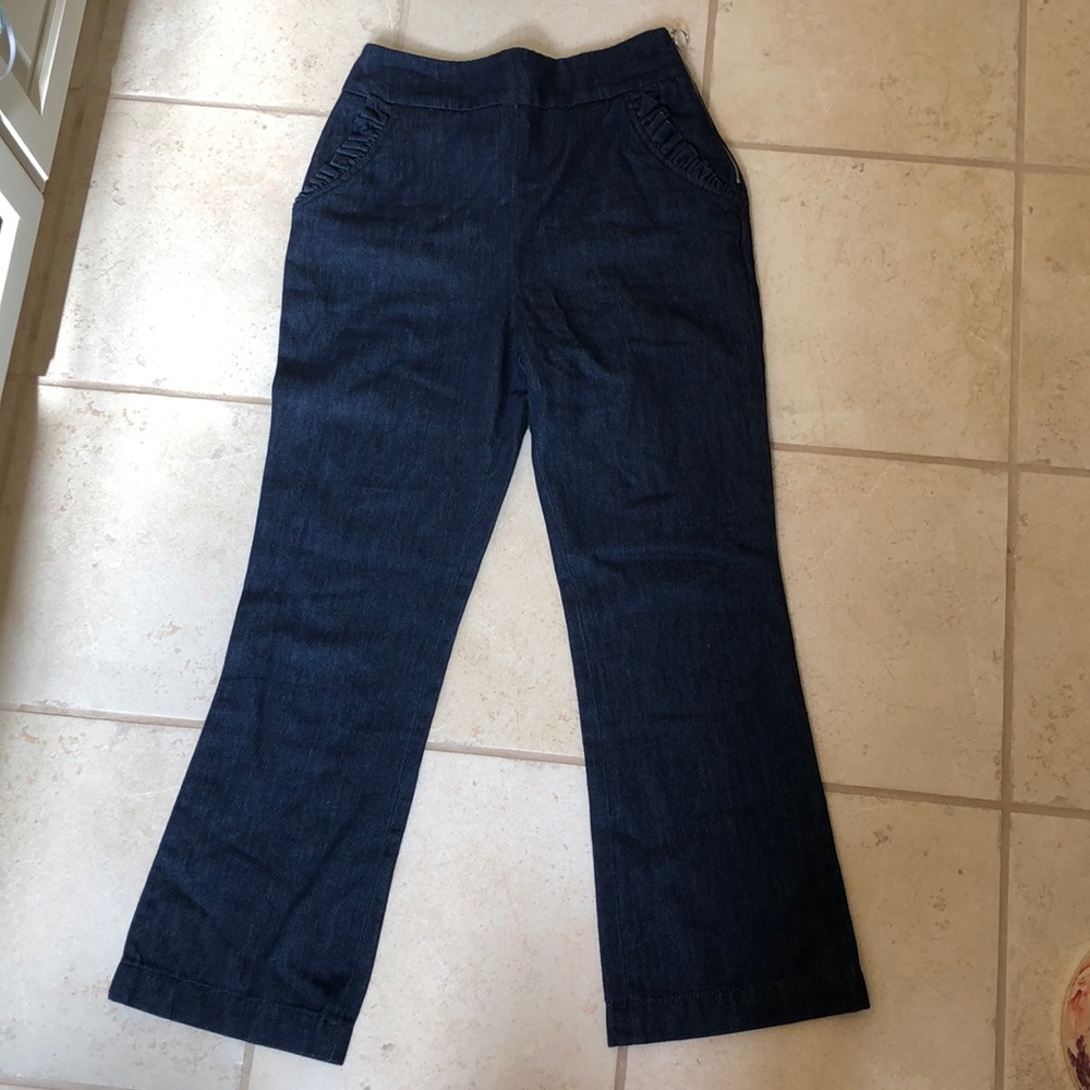 High waisted flare jeans with ruffles on pockets